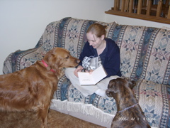 Nigel and Puck helping with the presents